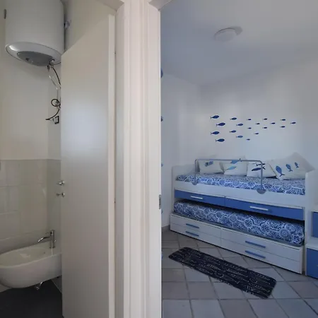 Paola Caposuvero Villa *