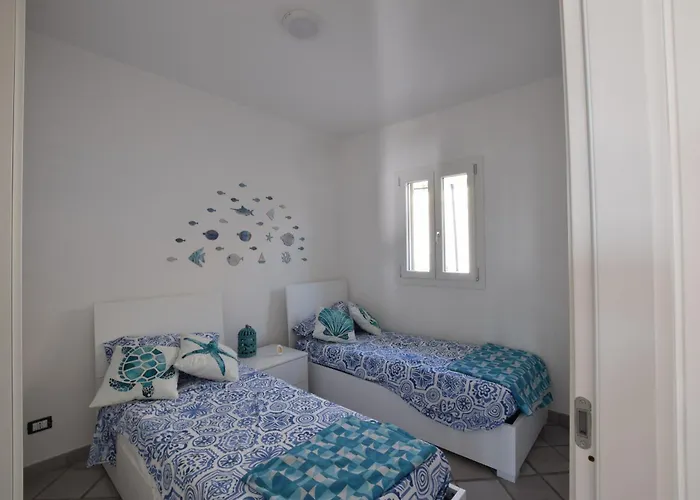 Paola Caposuvero Villa *